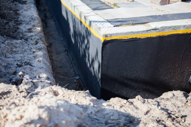 Professional Emergency Waterproofing technician working in Woodlawn, OH